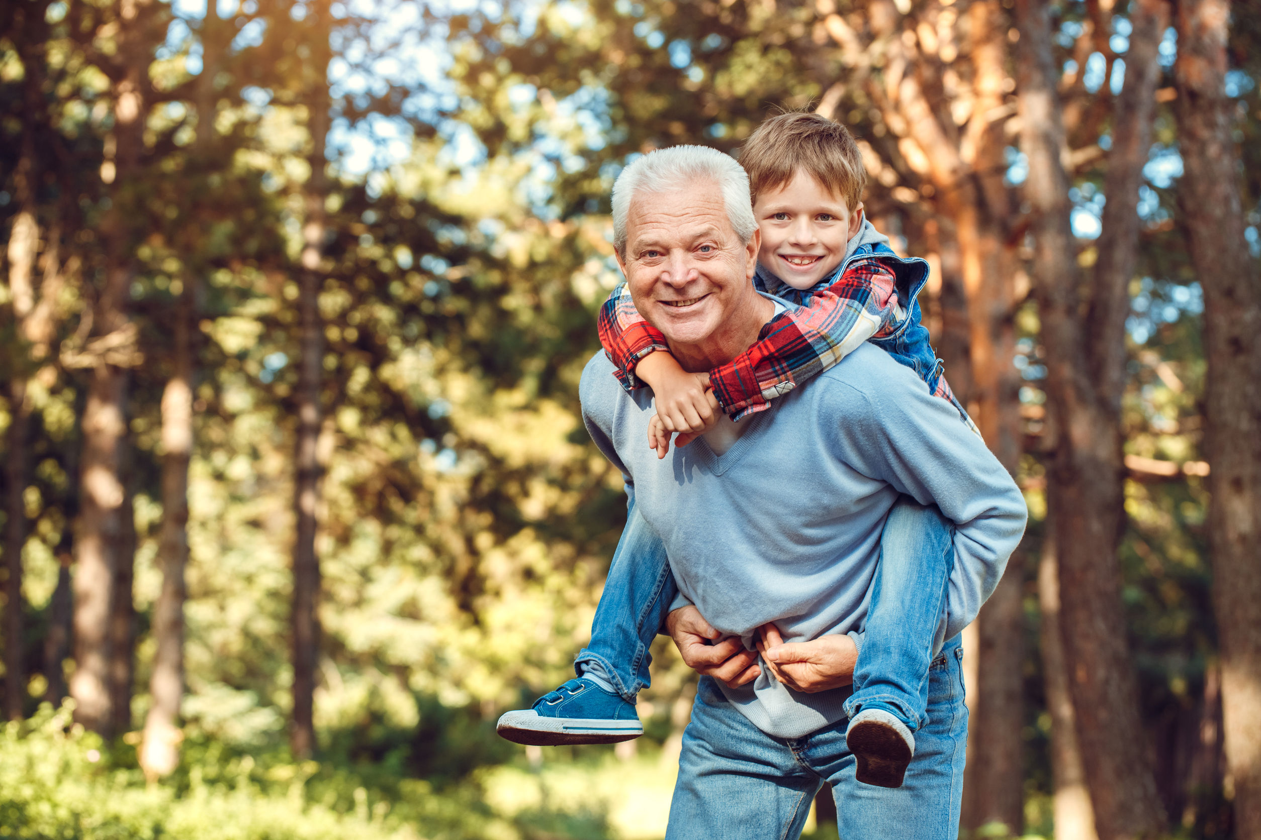 91496889 - grandfather and grandson together outdoors family concept